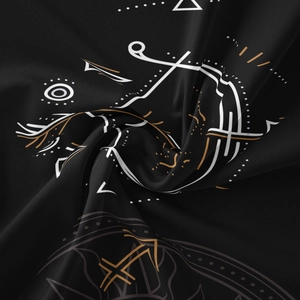 Detailed close-up showing fabric texture and mystic zodiac patterns on the black tapestry