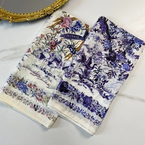 70cm satin silk scarf with elegant floral and crane prints on marble surface
