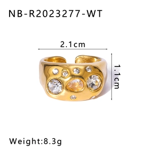 Detail view of 18k gold plated chunky ring with lava texture and white zircons