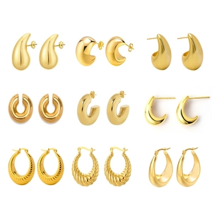 Nine pairs of gold-plated stainless steel geometric earrings in C-shape and teardrop designs