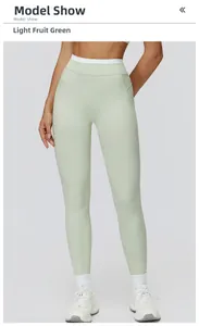 Detailansicht der High-Waist Yoga-Hose in Lichtfruchtgrün mit Kontrast-Bund in Weiß