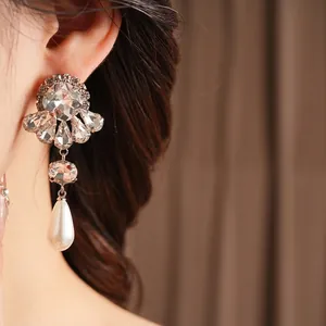 Elegant vintage silver earrings with floral crystals and teardrop pearls for women