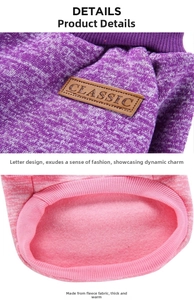 Detail view of purple knit fabric with classic leather patch and pink fleece lining