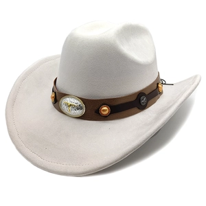 Detail of western cowboy hat with golden bull head metal buckle and brown leather band