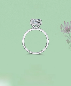 Macro shot of S925 sterling silver ring with brilliant round zircon and four-claw setting