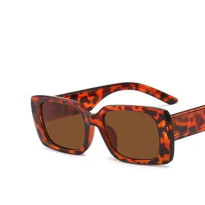 Retro rectangular sunglasses with thick tortoiseshell frames and brown lenses for women
