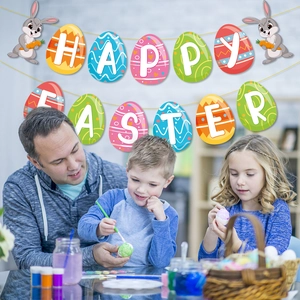 Happy Easter banner with cartoon rabbit and eggs hanging over family painting eggs