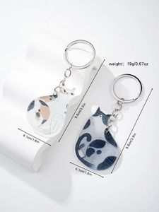 Cat keychain set dimensions and weight detail with calico and tabby patterns