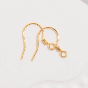 Macro shot of 18k gold plated S925 sterling silver ear hooks with spring loop detail