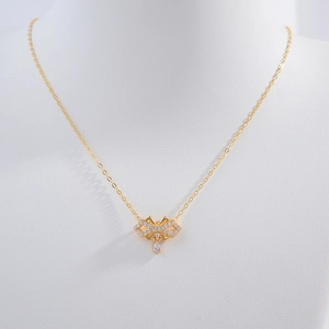 Elegant gold S925 sterling silver bow pendant necklace with sparkling zircons