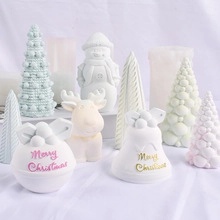 Detail view of assorted Christmas tree, snowman and reindeer scented wax ornaments