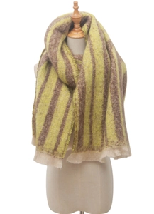 Detail of yellow and brown striped scarf with beige fringes on a wooden mannequin