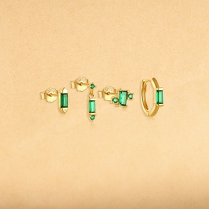 Detailed close-up showing S925 hallmark on gold square green zircon tassel earrings