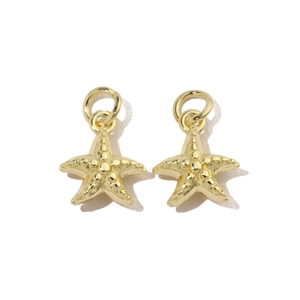 Detailed view of two gold starfish pendants with jump rings for DIY jewelry making