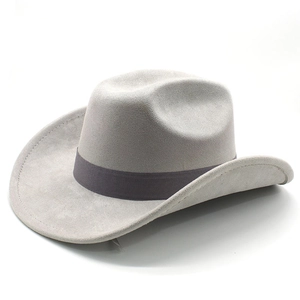 Detail of light gray faux suede cowboy hat showing textured brim and gray woven ribbon