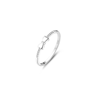 Macro shot of S925 sterling silver bow ring with small sparkling cubic zirconia stones