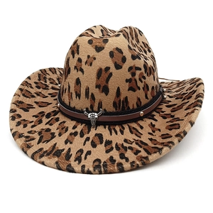 Detail of leopard print cowboy hat with vintage bull skull metal charm on trim