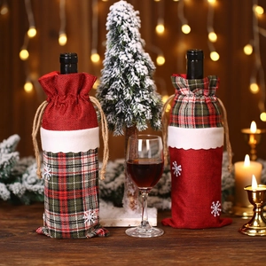 Housses de bouteilles de vin de Noël en toile de jute avec carreaux et flocons de neige