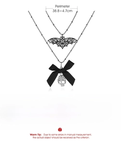 Detailed specs of double-layer punk bat necklace with bow and skull pendant details