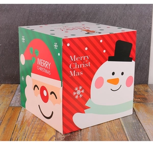 Detailed view of Christmas gift boxes with Santa and Snowman prints on a textured background