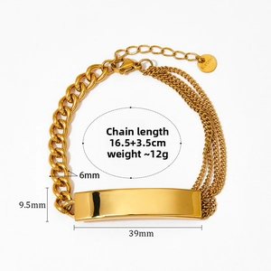 Detail view of a gold stainless steel layered bracelet with polished plate and lobster clasp