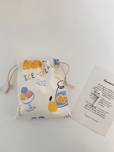 Minimalist cream drawstring storage bag with ice cream print and a decorative card