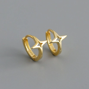 Detailed view of gold S925 sterling silver hoop earrings with hollow star cutouts