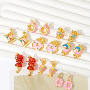 Collection of 15 gold-plated enamel dessert charms like donuts and candies for DIY jewelry