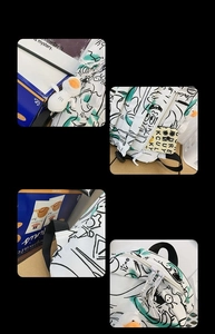 Detail showing graffiti backpack with astronaut charm, hidden zip and reinforced straps