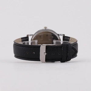 Back view of minimalist men's watch featuring black leather strap and silver metal case
