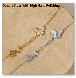 Detail of butterfly bracelet featuring mother of pearl and zircons with polished finish