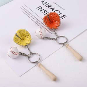 Detail view of 3-in-1 baseball keychain with mini leather glove, wood bat and ball