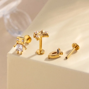 Titanium flat back stud earrings set with gold finish and sparkling zircon stones