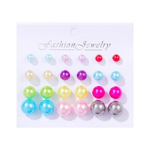 Flat lay of a 12-pair multi-color faux pearl stud earring set in assorted sizes on a card