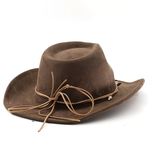 Detail of suede western cowboy hat with brown decorative string and colorful beads