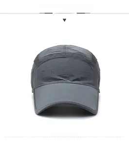 Detail of grey quick-dry baseball cap with SDR logo and micro-grid fabric texture
