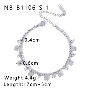 Detail of silver titanium butterfly bracelet with sparkling rhinestones and lobster clasp