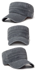 Detail view of washed cotton cadet cap in dark grey with reinforced stitching and eyelets