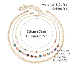 Detailed view of 3-layer gold butterfly necklace set with length measurement labels