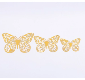 Three-piece set of yellow hollow butterfly wall stickers in varying sizes for home decor