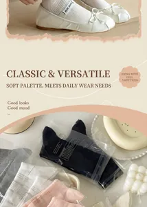 Detail of sheer ribbed knit crew socks in white pink and grey with individual packaging