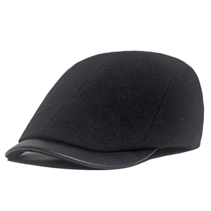 Classic black wool beret cap with premium leather brim and warm textured finish