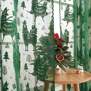 Green Christmas lace curtain with festive llama pattern and Happy Holidays text