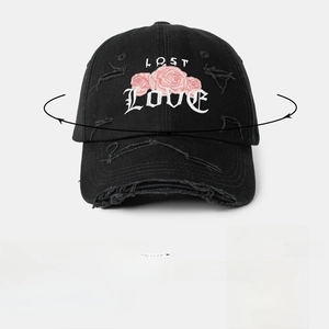 Distressed black baseball cap with rose embroidery and LOST LOVE text on crown