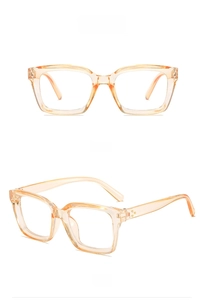 Macro view of transparent orange square frame glasses showing front and side profile details