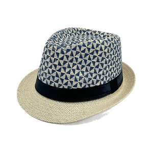 Classic straw fedora hat with blue geometric pattern crown and black satin ribbon band