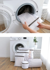 Mesh laundry bag set for washing machine protection showing various sizes and zipper detail