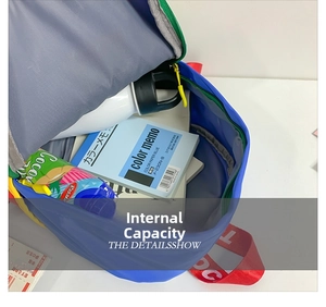 Internal view of colorful canvas backpack showing spacious capacity for kids' notebooks