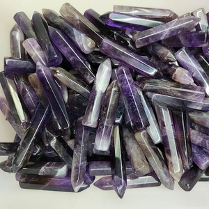 Macro view of natural amethyst hexagonal prisms with rose vintage floral details