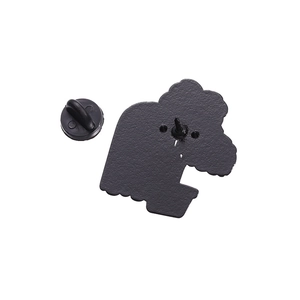 Detailed back view of enamel pin with black metal base and secure rubber clutch